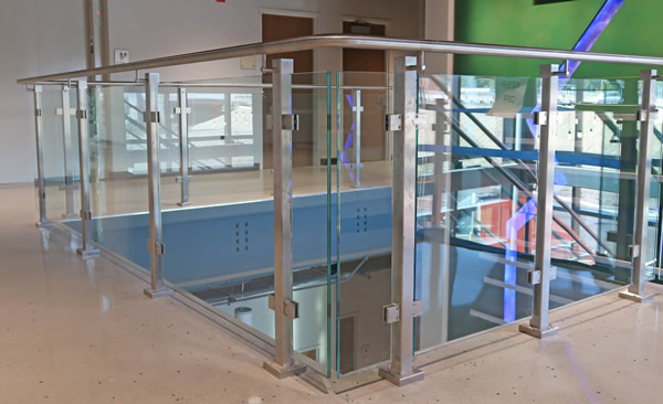 Custom glass hand rail installation
