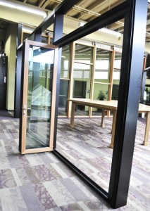 Inside Solar: Wood Veneer Vinyl-Composite Folding Glass Wall