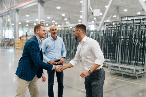 From left, Giovanni Quarti – Export Area Manager at Forel Spa, Carlo Zuccarello – Global Sales Manager at Forel Spa, Maciej Migalski – President at Press Glass Inc.