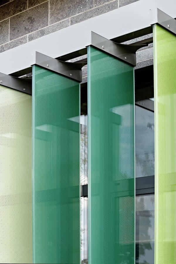 Picture credits: Schüco International KG The large louvre blades have been screen printed with a grid of dots and can be rotated on a radius of 90°, thereby automatically being able to follow the angle of the sun.