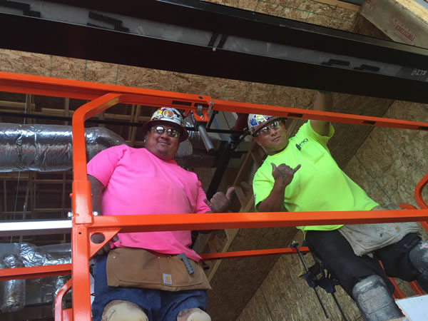 Shown here are 2 union certified glaziers at work on the project. Giroux Glass, Inc. employs only union-certified glaziers. Shown here are Jonathan "Junior" Perez and Kawelo McKeague at work.