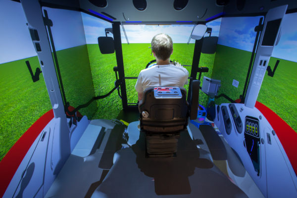 CAVE Projection System Simulating the inside of a tractor for training
