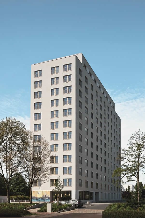 Picture credits: Schüco International KG The building at Lyoner Straße 30 in Frankfurt am Main after renovation: floor-to-ceiling window doors give the building the appearance of a modern apartment building.