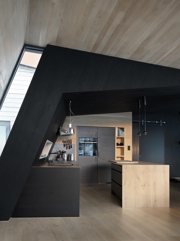 Photo Credits: Invit Arkitekter, Ålesund // Photographer: Johan Holmquist The interior shell features a classic construction - an insulated wooden frame system cladded with painted and natural spruce panels.