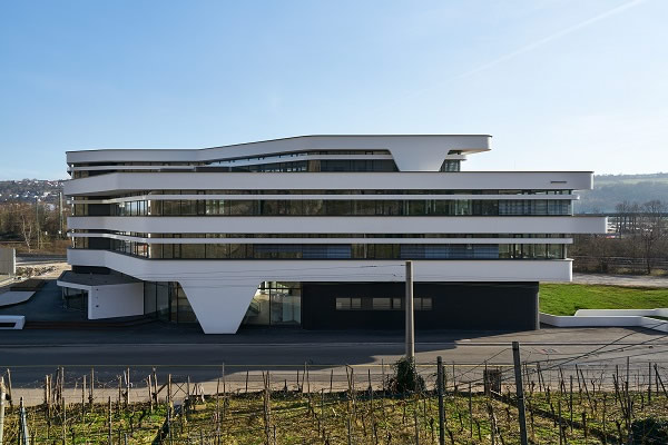 Picture credits: Schüco International KG The narrow profiles make the façade look like continuous ribbon windows from the outside.