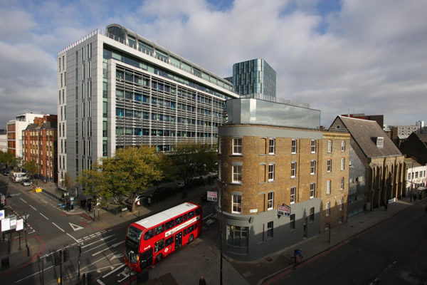 Mirrored glass to structural facade in central London