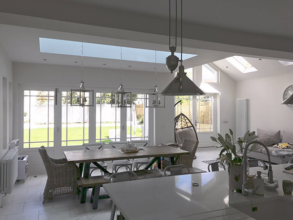 Timber bi-fold French doors, windows and skylight installation in Hampstead
