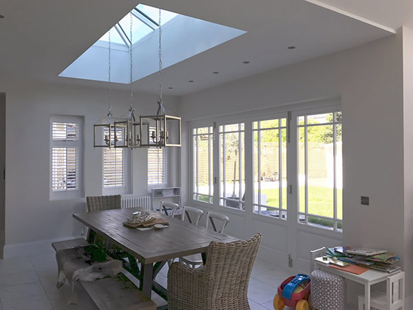 Timber bi-fold French doors, windows and skylight installation in Hampstead