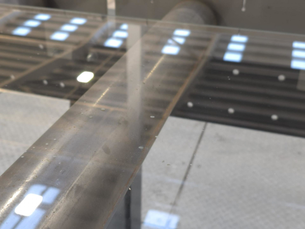 Transforming Glass Manufacturing: Intelligent Robotic Inspection for Tiny Inclusions in Glass