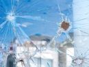 Laminated Security Glazing and Ballistic Assault: Standards and Performance