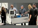 Andrew Haring, Representative of FHC, the Friese Foundation, and the Facade Tectonics Institute leadership, celebrating a $10,000 contribution supporting the Institute's mission.