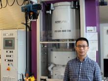 Dr. Hu Tang, first author of the study, in front of a high-pressure press at the Bavarian Research Institute of Experimental Geochemistry and Geophysics (BGI). © UBT / Chr. Wißler.