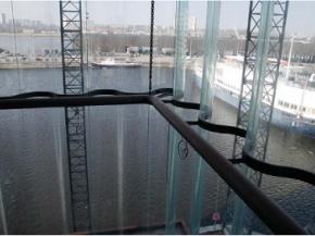 The view through the 11-meter high corrugated glass facade in Antwerp