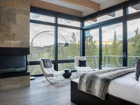 Architectural glass walls offering 360-degree views and insulation trending in resort areas