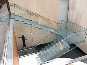 The new, all-glass staircase at the recently renovated Onassis Cultural Center museum is a feat of engineering excellence.