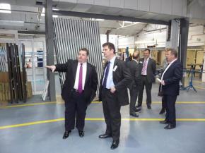 Hazlemere Group Chairman Stuart Braham showing High Wycombe MP Steven Baker Hazlemere Windows Factory