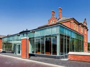 SOLARBAN 70XL glass with Walker Textures acid-etching transforms historic Humber College building