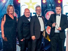 Gareth Jones and Brian McDonald receive the award from Event Director, Nickie West.