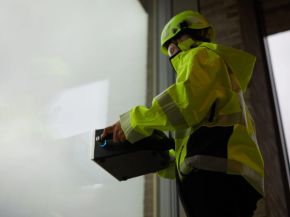 Sparklike Laser Portable being used on a window