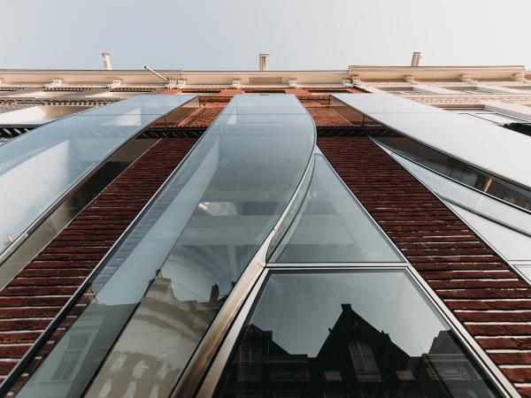 Complex Curved Storefront: The Looking Glass