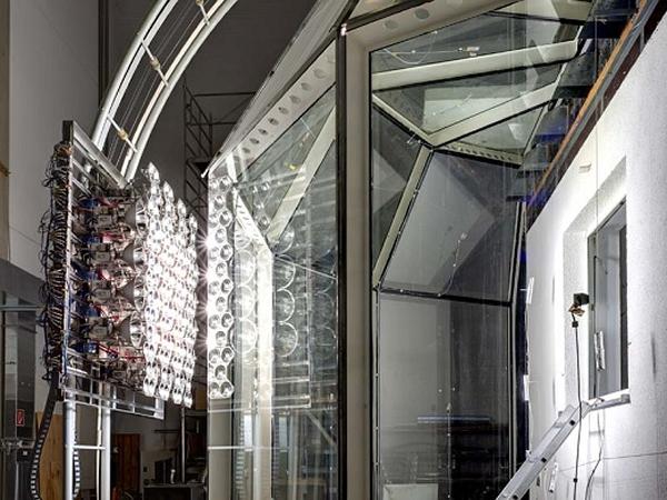 Solar Thermal Glass Facades with Adjustable Transparency