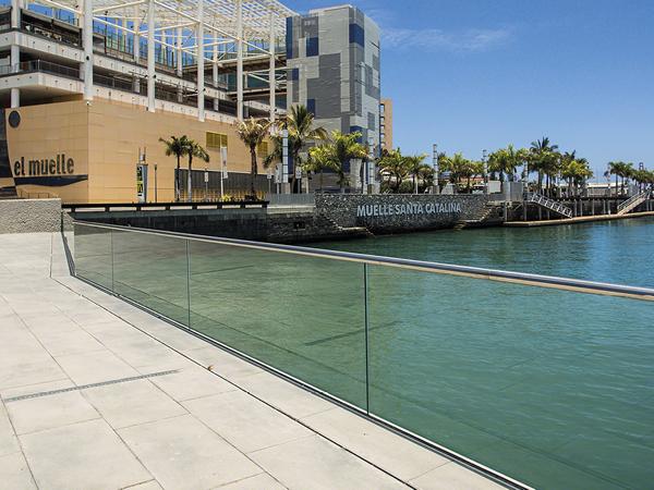 A glass railing system for safety and sea views