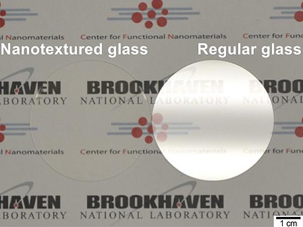 The image compares the glare from a conventional piece of glass (right) to that from nanotextured glass (left), which shows no glare at all.