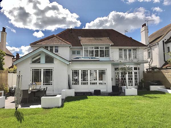 Timber bi-fold French doors, windows and skylight installation in Hampstead