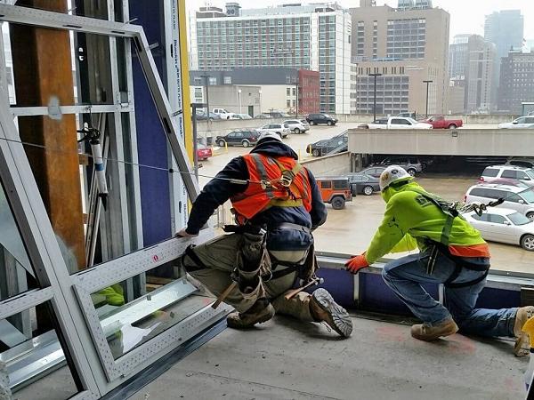 Graboyes technicians prepare to install an Intus window at The Hamilton Graboyes technicians prepare to install an Intus window at The Hamilton