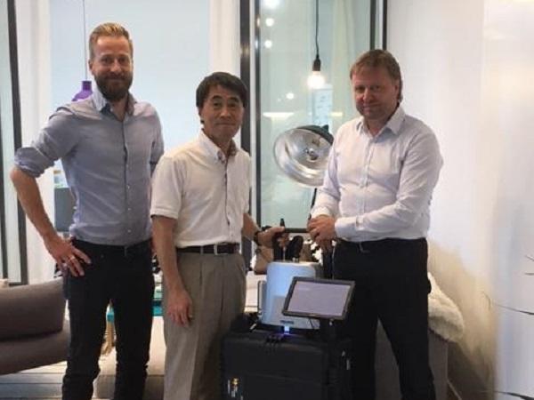 Correns Corporation's Mr. Yasuhiko Kojima with Sparklike's CEO  Mr. Miikkael Niemi and Sales Director Mauri Saksala