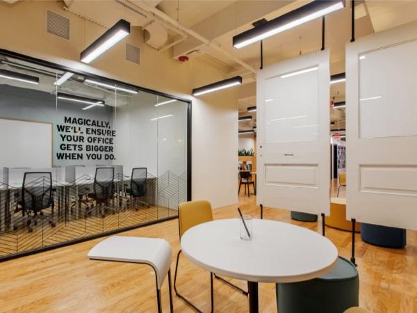 Interior storefront glass and custom white board doors in Spaces Philadelphia | Photo © Sarah R. Bloom Interior storefront glass and custom white board doors in Spaces Philadelphia | Photo © Sarah R. Bloom
