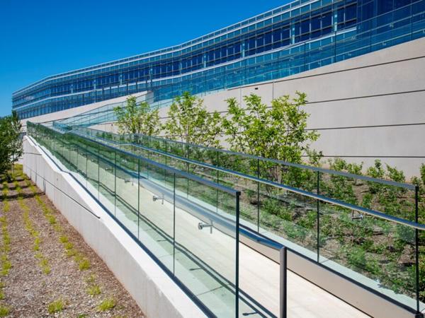 The exterior precast ramp features 220 linear feet of Track Rail with Klik LED pod lighting to safely guide staff and visitors. The exterior precast ramp features 220 linear feet of Track Rail with Klik LED pod lighting to safely guide staff and visitors.