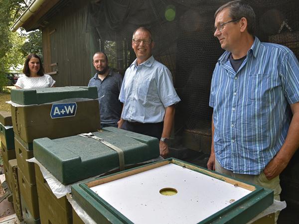 From left: Bettina Jost, Head of the Marketing Department; David Gorr, initiator of the sponsorship; Peter Dixen, CEO of A+W and beekeeper Kay Lürßen.