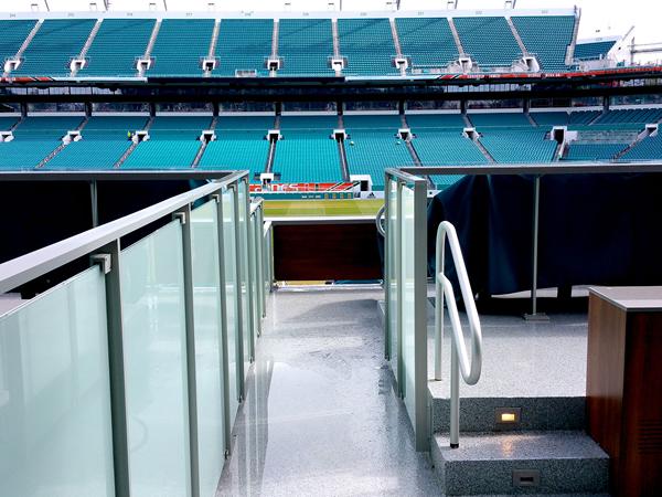 Custom post supported glass railing attached via top and fascia mount. Custom post supported glass railing attached via top and fascia mount.