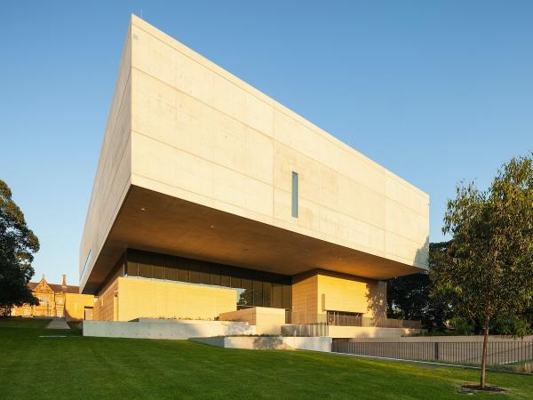 The colloquially named floating white concrete box is located directly adjacent to the main building of Australia's oldest university. © Fretwell Photography The colloquially named floating white concrete box is located directly adjacent to the main building of Australia's oldest university. © Fretwell Photography