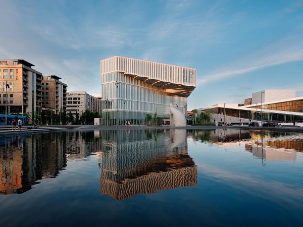 Visible from afar: The new Deichman Library with its cantilevered upper storeys and translucent facade. Visible from afar: The new Deichman Library with its cantilevered upper storeys and translucent facade.