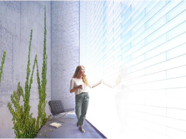 An entire wall of aerogel glass bricks brings daylight from outside into the interior - along with its positive effects on the occupants - and is still highly insulting. Image: Empa